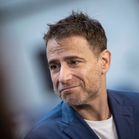 NEW YORK, NY - JUNE 20: Stewart Butterfield, co-founder and chief executive officer of Slack, does a television interview outside the New York Stock Exchange (NYSE), June 20, 2019 in New York City. Th ...