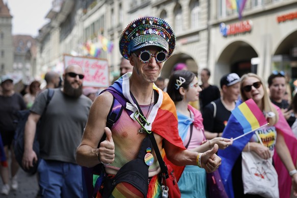 People take part in a pride parade in Bern, Switzerland, Saturday, July 25, 2026. (KEYSTONE/Peter Klaunzer)