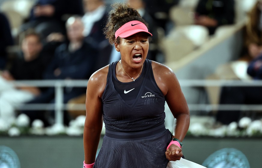 epa11377936 Naomi Osaka of Japan reacts during her Women&#039;s Singles 2nd round match against Iga Swiatek of Poland during the French Open Grand Slam tennis tournament at Roland Garros in Paris, Fra ...