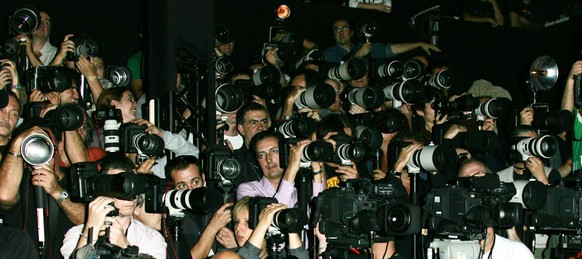 Atmosphere - Photographers during Paris Fashion Week Spring/Summer 2007 - Celine - Front Row at Les Tuileries in Paris, France. (Photo by Toni Anne Barson Archive/WireImage)