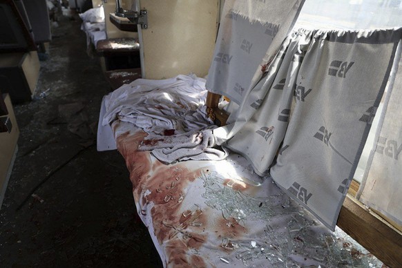 epa12194703 A handout photo made available by the Dnipropetrovsk Regional Military Administration shows a damaged passenger train following Russian shelling in the city of Dnipro, Ukraine, 24 June 202 ...