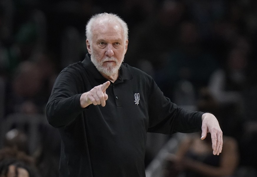 FILE - San Antonio Spurs coach Gregg Popovich points from the bench are during the second half of the team&#039;s NBA basketball game against the Boston Celtics, March 26, 2023, in Boston. Popovich ev ...