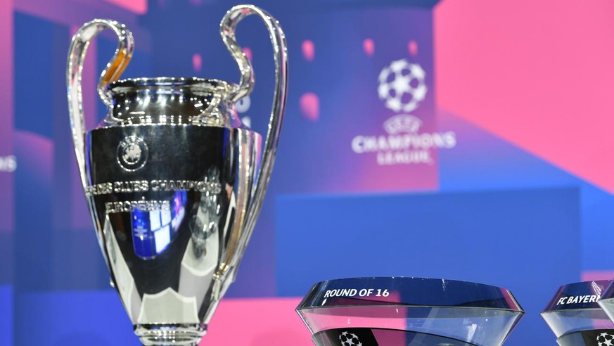 epa08883158 A handout photo made available by UEFA shows the Champions League trophy before the UEFA Champions League 2020/21 Round of 16 draw at the UEFA Headquarters, the House of European Football, ...