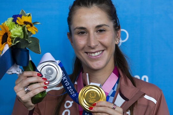 Belinda Bencic poses with her gold and silver medal, at the 2020 Tokyo Summer Olympics in Tokyo, Japan, on Sunday, August 01, 2021. (KEYSTONE/Peter Klaunzer)