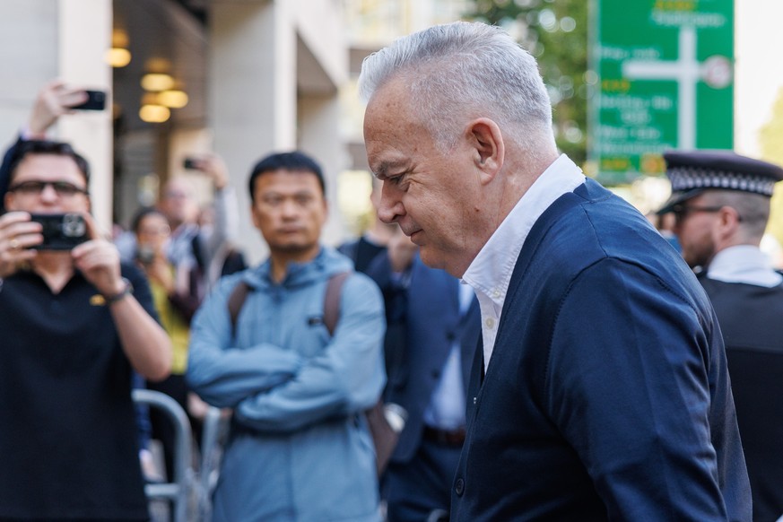epa11607598 Former BBC news presenter Huw Edwards (R) arrives at Westminster Magistrates&#039; Court for his sentencing hearing in London, Britain, 16 September 2024. Huw Edwards may face a sentence o ...