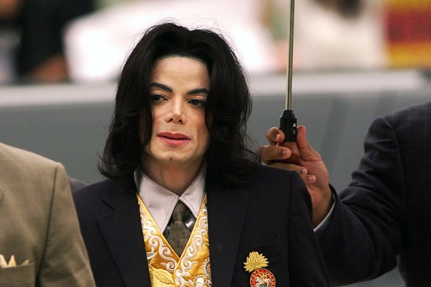 FILE - Michael Jackson arrives at the Santa Barbara County Courthouse for his child molestation trial in Santa Maria, Calif., May 25, 2005. A California appeals court on Friday, Aug. 18, 2023, revived ...