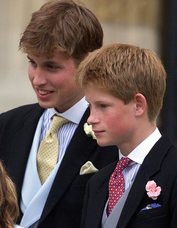 Prince William, left, and Prince Harry leave St George&#039;s Chapel in Windsor after the wedding of their uncle, Prince Edward and Sohpie Rhys-Jones Saturday, June 19, 1999. (AP Photo/Ian Waldie/POOL ...