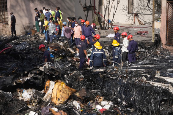 Search and rescue teams respond to the scene of a plane crash in Ahmedabad, India, Thursday, June 12, 2025. (AP Photo/Ajit Solanki)
India Plane Crash