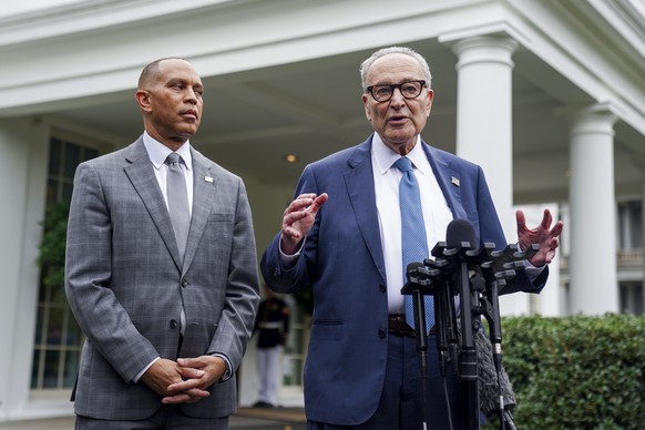 epa12415624 Senate Minority Leader Chuck Schumer and House Minority Leader Hakeem Jeffries deliver remarks to the news media following a meeting of Congressional leadership with President Trump at the ...