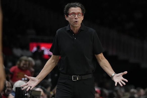 Atlanta Hawks head coach Quin Snyder reacts after a call during the first half of a preseason NBA basketball against the Cleveland Cavaliers Tuesday, Oct. 10, 2023, in Atlanta. (AP Photo/John Bazemore ...