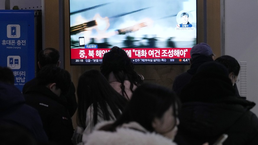 A TV screen shows a file image of North Korea&#039;s military exercise during a news program at the Seoul Railway Station in Seoul, South Korea, Saturday, Jan. 6, 2024. North Korea conducted a new rou ...
