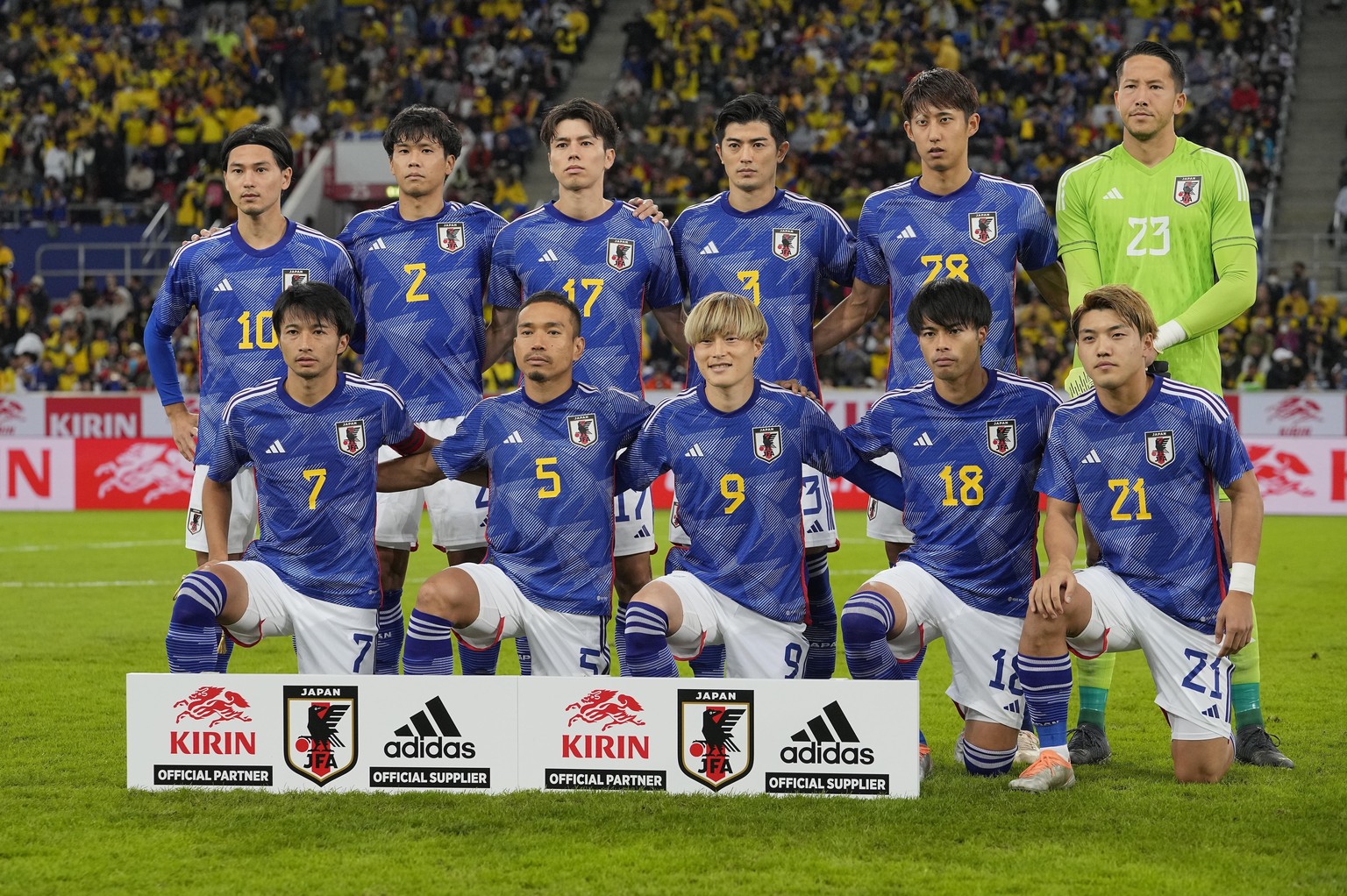 Japan's players stand for a team photo during the international friendly soccer match between Japan and Ecuador as part of the Kirin Challenge Cup in Duesseldorf, Germany, Tuesday, Sept. 27, 2022 ...