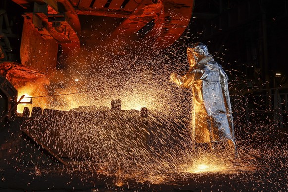 epa12704496 A worker conducts a tapping process at a nickel processing plant operated by PT Vale Indonesia in Sorowako, South Sulawesi, Indonesia, 04 February 2026. PT Vale Indonesia is one of the cou ...