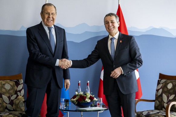 Russian Foreign Minister Sergei Lavrov, left, speaks to Switzerland&#039;s President and head of the Federal Department of Foreign Affairs Ignazio Cassis, right, on the sidelines of the US - Russia su ...