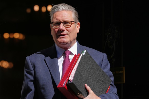 Britain's Prime Minister Keir Starmer leaves 10 Downing Street to attend the weekly session of Prime Minister's Questions in parliament in London, Wednesday, April 29, 2026. (AP Photo/Kirsty ...