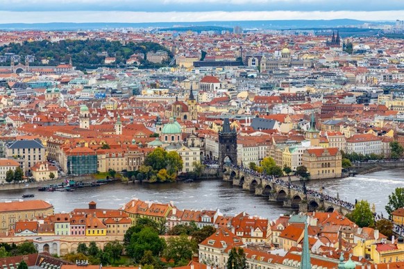 Prague cityscape showing lesser town and the old town with the medieval Charles bridge connecting the two areas across the Vltava river. (Photo by: Martin Berry/UCG/Universal Images Group via Getty Im ...