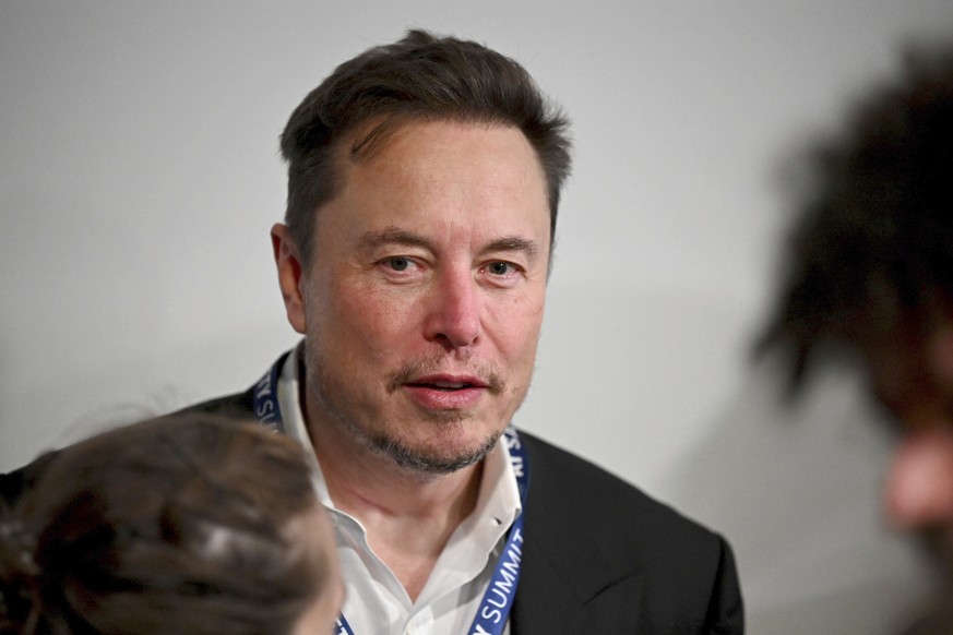 File - Tesla CEO Elon Musk attends the first plenary session of the AI Safety Summit at Bletchley Park, on Nov. 1, 2023 in Bletchley, England. The lawyers who successfully argued that a massive pay pa ...