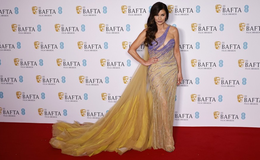 epa10478841 Catherine Zeta-Jones poses in the press room of the 2023 EE BAFTA Film Awards ceremony at the Southbank Centre, in London, Britain, 19 February 2023. The event is hosted by the British Aca ...