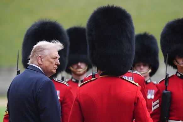 WINDSOR, ENGLAND - SEPTEMBER 17: US President Donald Trump reviews the guard of honour during the ceremonial welcome during the State visit by the President of the United States of America on Septembe ...