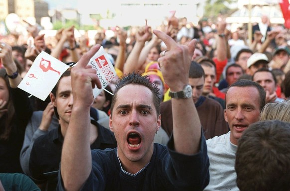 A young supporter of the candidature Sion 2006 shows his disappointment and anger in Sion, Switzerland, Saturday, June 19, 1999 immediately after the International Olympic Committee (IOC) president Ju ...