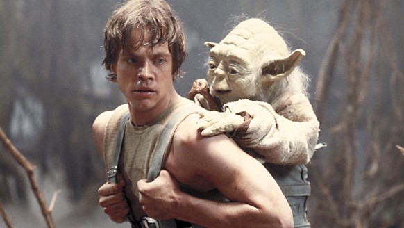 FILE - This image provided by Lucasfilm Ltd. shows Mark Hamill as Luke Skywalker and the character, Yoda, in a scene from the 1980 movie &amp;quot;Star Wars Episode V: The Empire Strikes Back.&amp;quo ...