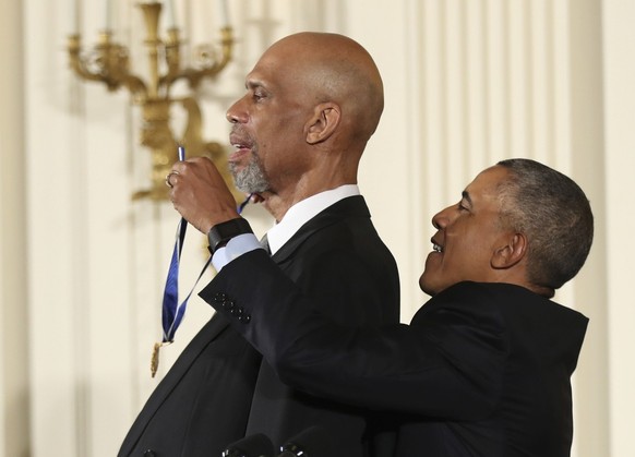 President Barack Obama presents the Presidential Medal of Freedom to former NBA basketball player Kareem Abdul Jabbar during a ceremony in the East Room of the White House Tuesday, Nov. 22, 2016, in W ...