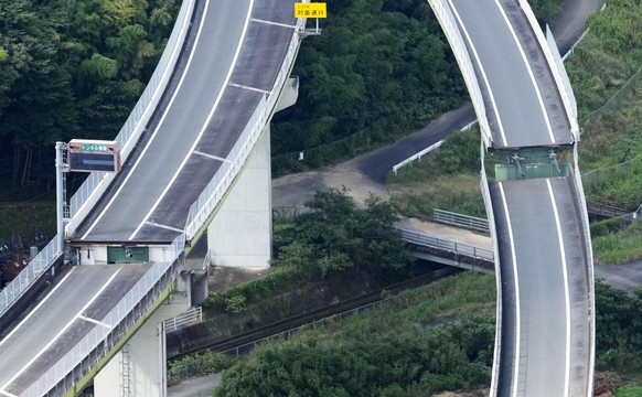 This aerial image shows a damaged highway after an earthquake in Yatsushiro, Kumamoto Prefecture, on Wednesday, July 29, 2026. (Naoki Hiraoka/Kyodo News via AP)
Japan Earthquake