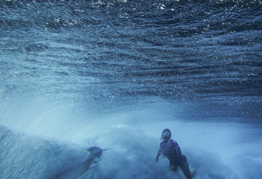 Johanne Defay, of France, wipes out in the women&amp;#039;s bronze medal final in the surfing competition during the Paris 2024 Olympic Games in Teahupo&amp;#039;o, Tahiti, Monday, Aug. 5, 2024. (Ben  ...