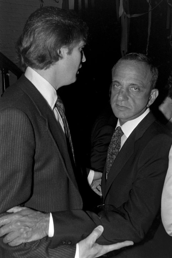 Donald Trump (L) and Roy Cohn attend a party at Le Club in New York City on June 12, 1979. (Photo by Dustin Pittman/Penske Media via Getty Images)