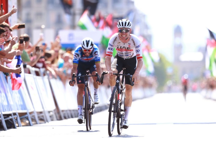 SAN SEBASTIAN, SPAIN - AUGUST 10: (L-R) Julian Alaphilippe of France and Team Soudal Quick-Step and race winner Marc Hirschi of Switzerland and UAE Team Emirates sprint at finish line during the 44th  ...