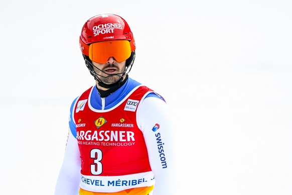 epa09838002 Loic Meillard of Switzerland reacts in the finish area during the second run of the Men&#039;s Slalom race at the FIS Alpine Skiing World Cup finals in Meribel, France, 20 March 2022. EPA/ ...