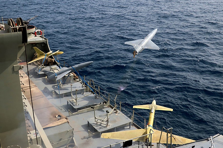 FILE - In this photo released by the Iranian Army on Aug. 25, 2022, a drone is launched from a warship in a military drone drill in Iran. As protests rage at home, Iran&#039;s theocratic government is ...
