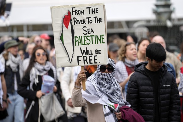 People protest at a Pro-Palestinian demonstration for excluding Israel from Eurovision ahead of the second semi-final at the Eurovision Song Contest in Malmo, Sweden, Thursday, May 9, 2024. (AP Photo/ ...