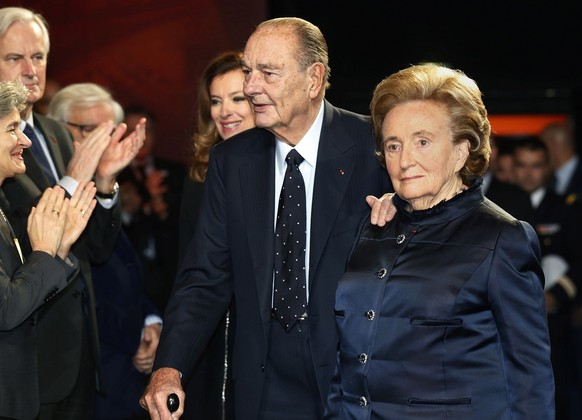 FILE - In this Nov.21, 2013 file photo, former French President Jacques Chirac, and his wife Bernadette Chirac arrive to attend the award ceremony for the "Prix de la Fondation Chirac" in Pa ...