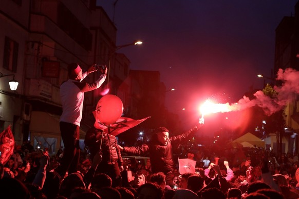 Morocco fans celebrate the victory after the World Cup Group F soccer match between Canada and Morocco, in Casablanca, Thursday, Dec. 1, 2022. Morocco qualified for the round of 16 of the World Cup af ...