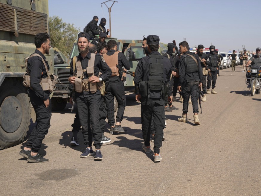 Des membres des forces gouvernementales syriennes se sont d