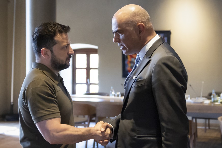 Volodymyr Zelensky, President of Ukraine, left, and Swiss Federal President Alain Berset, shake hands during a bilateral meeting at the European Political Community (EPC) Summit at the Mimi Castle in  ...