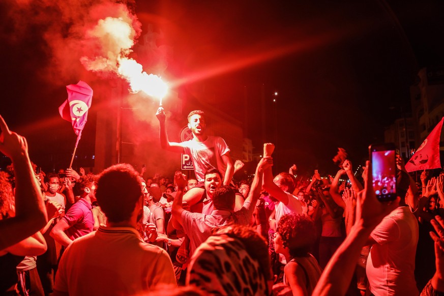 epa09368008 Supporters of Tunisia&#039;s President Kais Saied gather on the streets after he dismissed the government and froze parliament, in Tunis, Tunisia, 25 July 2021 (issued 26 July 2021). Prote ...