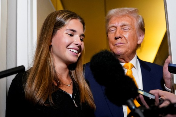 U.S. President Donald Trump&#039;s granddaughter Kai Madison Trump speaks to the media on board Air Force One on the way to West Palm Beach, Florida, U.S., April 13, 2025. REUTERS/Nathan Howard