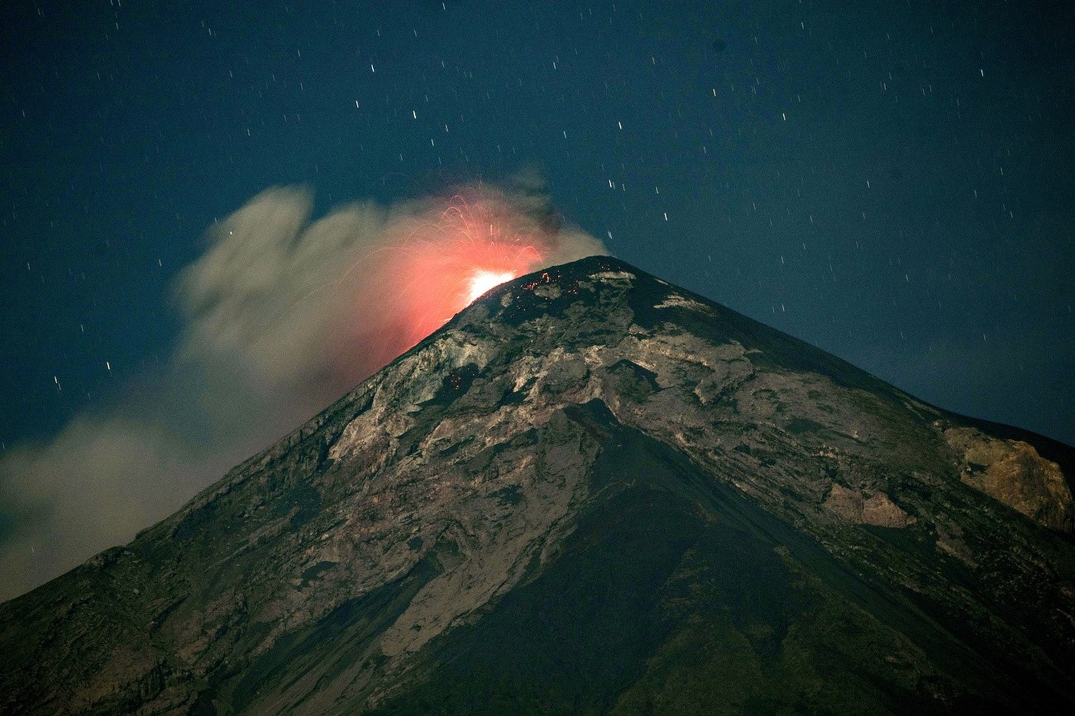 epa10609755 View of volcanic activity at the Volcan de Fuego, in Alotenango, Guatemala, 04 May 2023. Guatemalan civil protection authorities declared an institutional alert on Thursday due to the incr ...