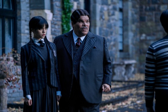 Wednesday. (L to R) Jenna Ortega as Wednesday Addams, Luis Guzmán as Gomez Addams in episode 101 of Wednesday. Cr. Vlad Cioplea/Netflix © 2022