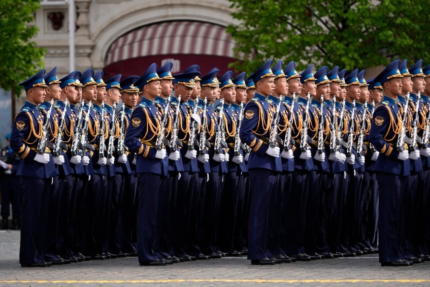 North Korean servicemen stand in a formation before the Victory Day military parade at Red Square in central Moscow on May 9, 2026. Russia celebrates the 81st anniversary of the Soviet Union's vi ...