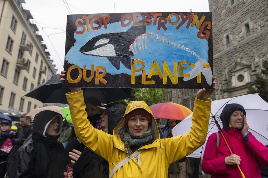 epa11289257 Activists rally on the occasion of the global climate strike day in Zurich, Switzerland, 19 April 2024. The protest is part of the global climate strike of the international movement to pr ...