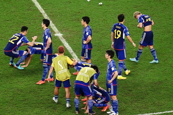 epa10350208 Players of Japan react after the FIFA World Cup 2022 round of 16 soccer match between Japan and Croatia at Al Janoub Stadium in Al Wakrah, Qatar, 05 December 2022. EPA/Georgi Licovski