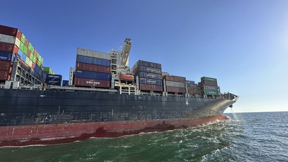 In this photo provided by Ukraine&#039;s Infrastructure Ministry Press Office, container ship Joseph Schulte (Hong Kong flag) leaves the port of Odesa to proceed through the temporary corridor establi ...
