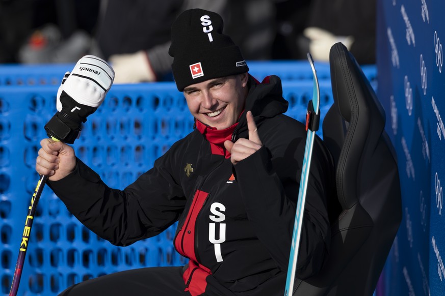 Switzerland's Franjo von Allmen reacts in the leaderbox during the men's alpine skiing downhill race at the 2026 Olympic Winter Games at the Stelvio Ski centre in Bormio, Italy, on Saturday, ...