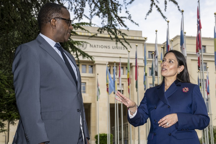 Rwandan Foreign Minister Vincent Biruta, left, and Britain&#039;s Home Secretary Priti Patel, right, speaks during an interview with the Associated Press at the European headquarters of the United Nat ...