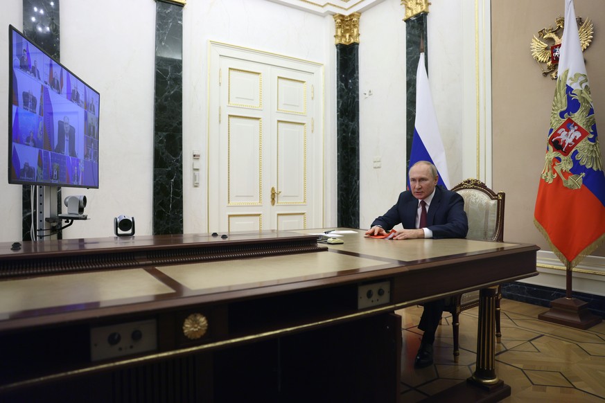 epa10214216 Russian President Vladimir Putin chairs a meeting with the members for Russian security Council via a video conference at the Kremlin in Moscow, Russia, 29 September 2022. EPA/GAVRIIL GRIG ...