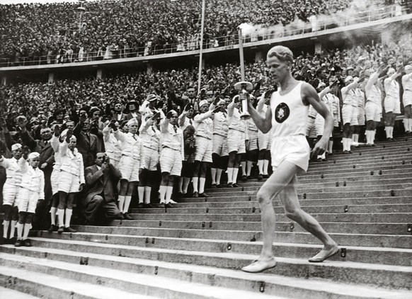 GERMANY - JANUARY 08: Beginning of the eleventh Olympic Games. Photography. 1.8.1936. (Photo by Imagno/Getty Images) [Der Beginn der XI. Olympischen Spiele. Photographie. 1.8.1936]