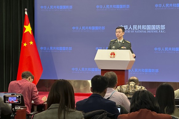 China&#039;s Defense Ministry spokesperson Col. Wu Qian speaks to reporters at a monthly briefing in Beijing, Thursday, Dec. 28, 2023. Weeks before Taiwan holds elections for its president and legisla ...